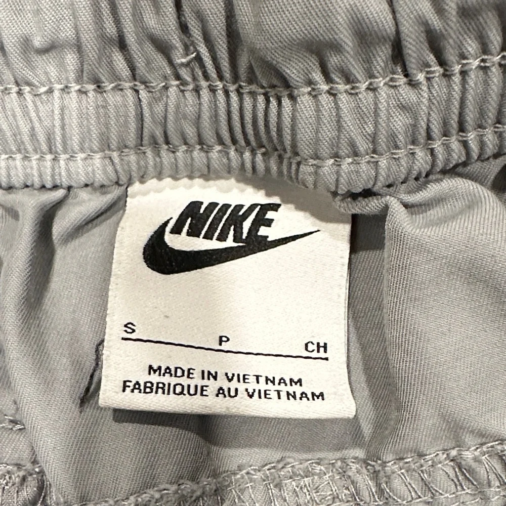 Nike Kids Gray Sweatpants with Pink and Yellow Accents